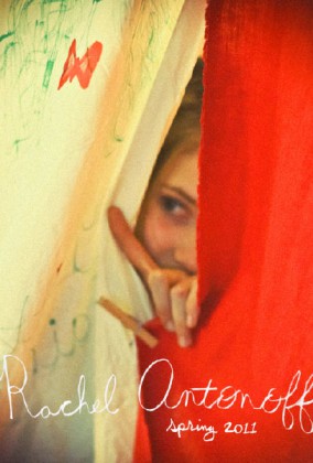 Artist Danny Roberts Photo of a girl Peeking between a white and Red Sheet held together by a close pins. Picture is from Rachel Antonoff spring 2011 Collection.