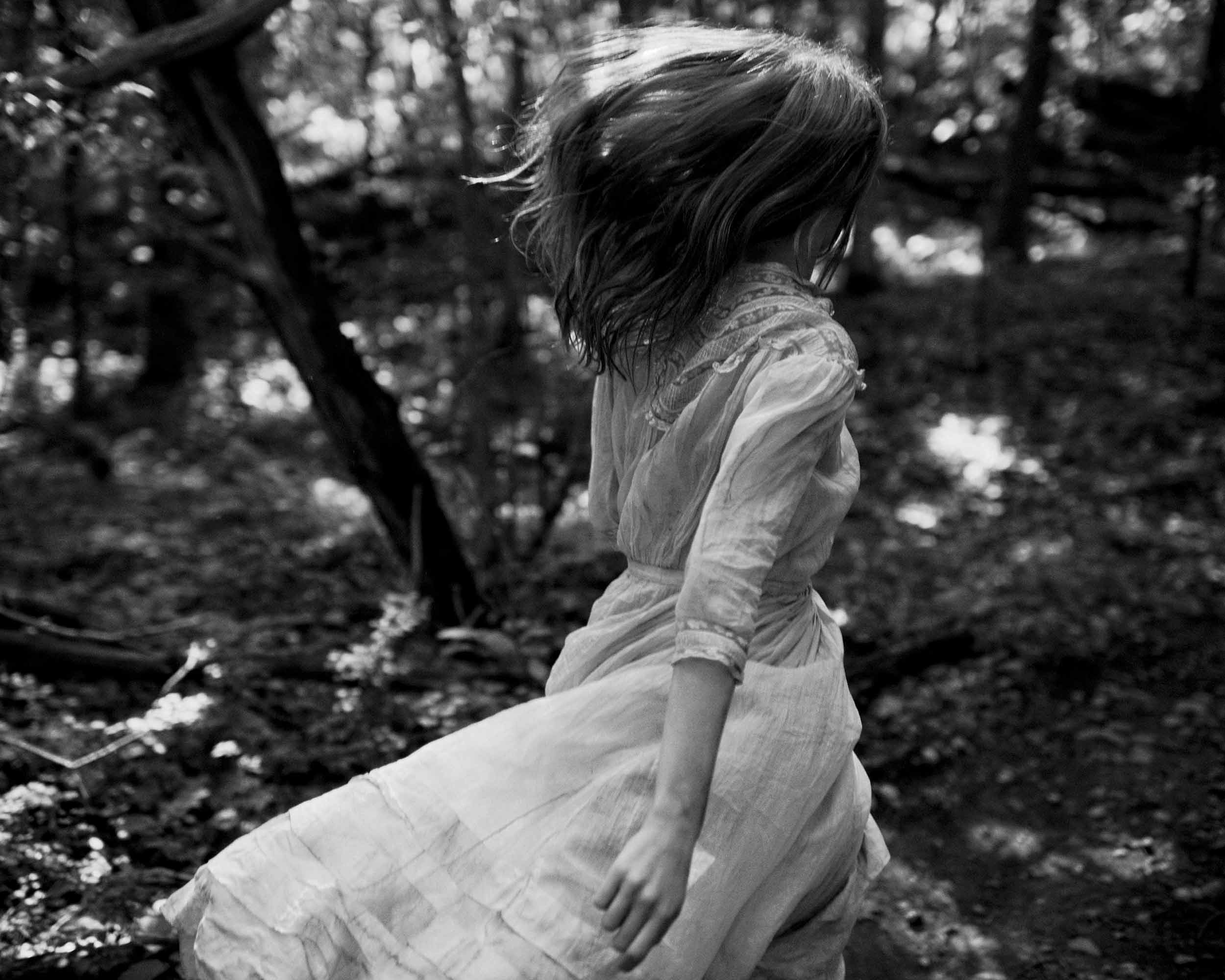 Julia Hafstrom running in the forest black and white danny roberts